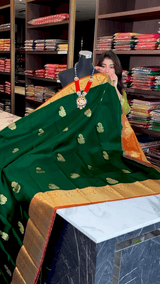 Impressive Dark Green Soft Banarasi Silk Saree With Lovely Blouse Piece