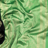 Shravya - Black Soft Silk Saree with Mint Green Zari Border and Gold Motifs