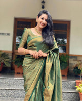 Mitera Green Woven Designer Party Wear Soft Silk Lichi Silk Saree .