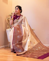Bhagyam – Beige Soft Banarasi Silk Saree with Wine Jacquard Pallu