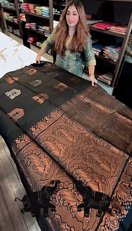 Gratifying Black Soft Banarasi Silk Saree With Intricate Blouse Piece