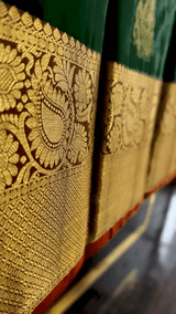 Impressive Dark Green Soft Banarasi Silk Saree With Lovely Blouse Piece