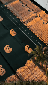 Desuetude Dark Green Soft Banarasi Silk Saree With Gorgeous Blouse Piece