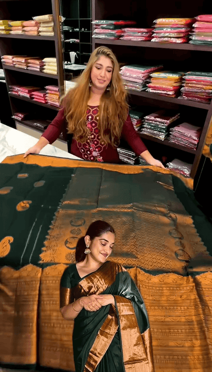Desuetude Dark Green Soft Banarasi Silk Saree With Gorgeous Blouse Piece