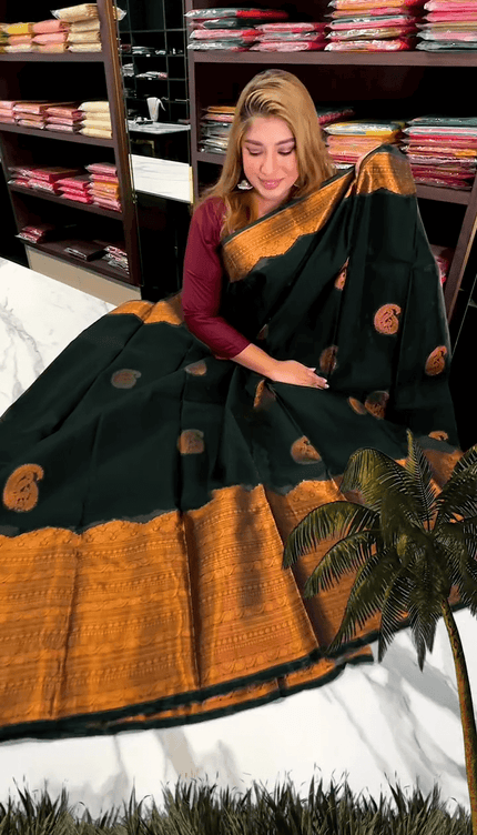 Desuetude Dark Green Soft Banarasi Silk Saree With Gorgeous Blouse Piece
