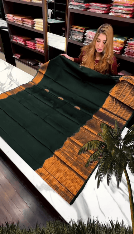 Desuetude Dark Green Soft Banarasi Silk Saree With Gorgeous Blouse Piece