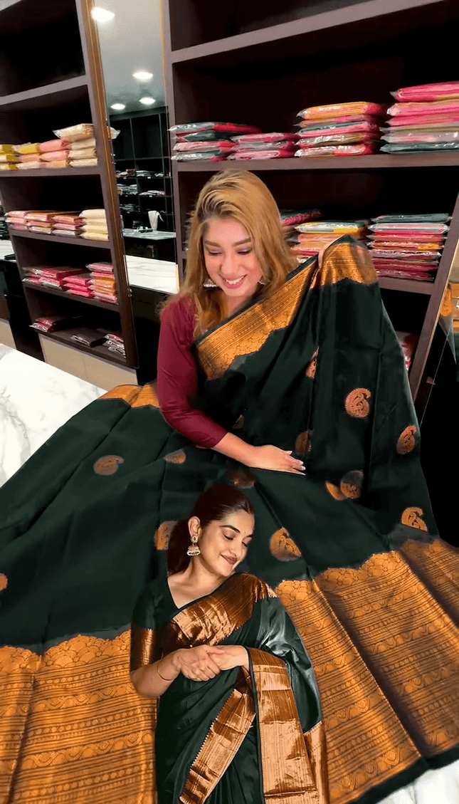 Desuetude Dark Green Soft Banarasi Silk Saree With Gorgeous Blouse Piece