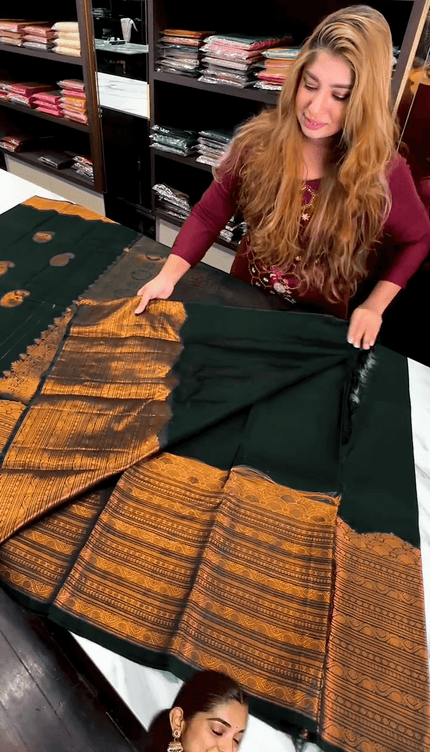 Desuetude Dark Green Soft Banarasi Silk Saree With Gorgeous Blouse Piece
