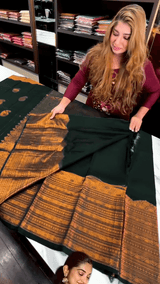 Desuetude Dark Green Soft Banarasi Silk Saree With Gorgeous Blouse Piece