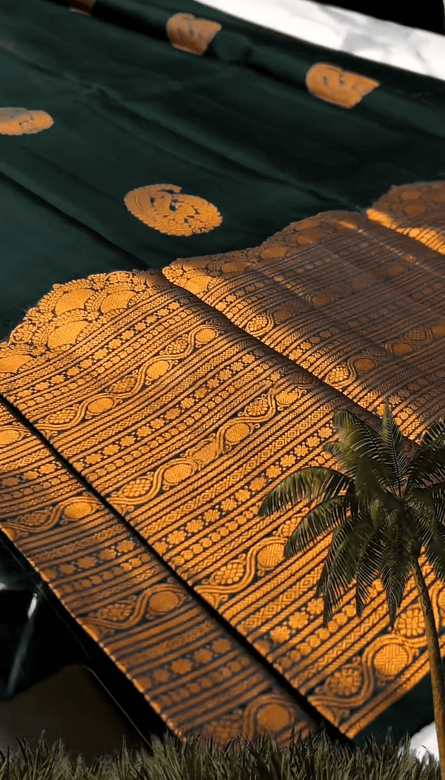 Desuetude Dark Green Soft Banarasi Silk Saree With Gorgeous Blouse Piece