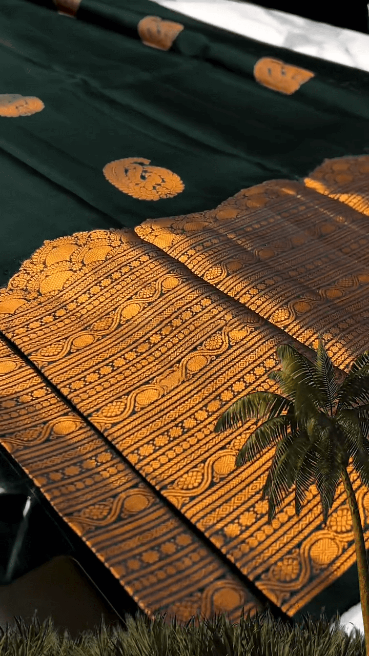 Desuetude Dark Green Soft Banarasi Silk Saree With Gorgeous Blouse Piece