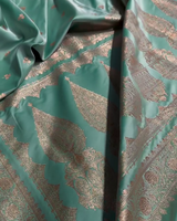 Urmila – Green Banarasi Semi-Katan Silk Saree with Golden Zari Butta and Broad Border