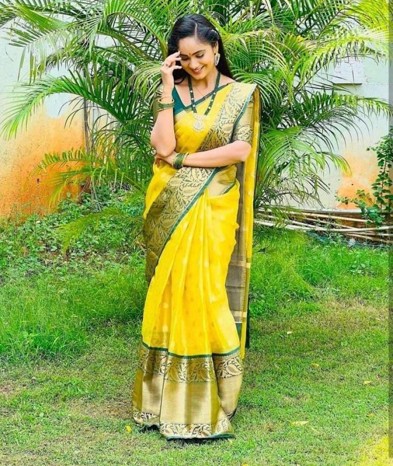 Bright Yellow Saree with Green Zari Border