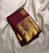 Maroon Kanjivaram Silk Saree with Golden Peacock Motifs