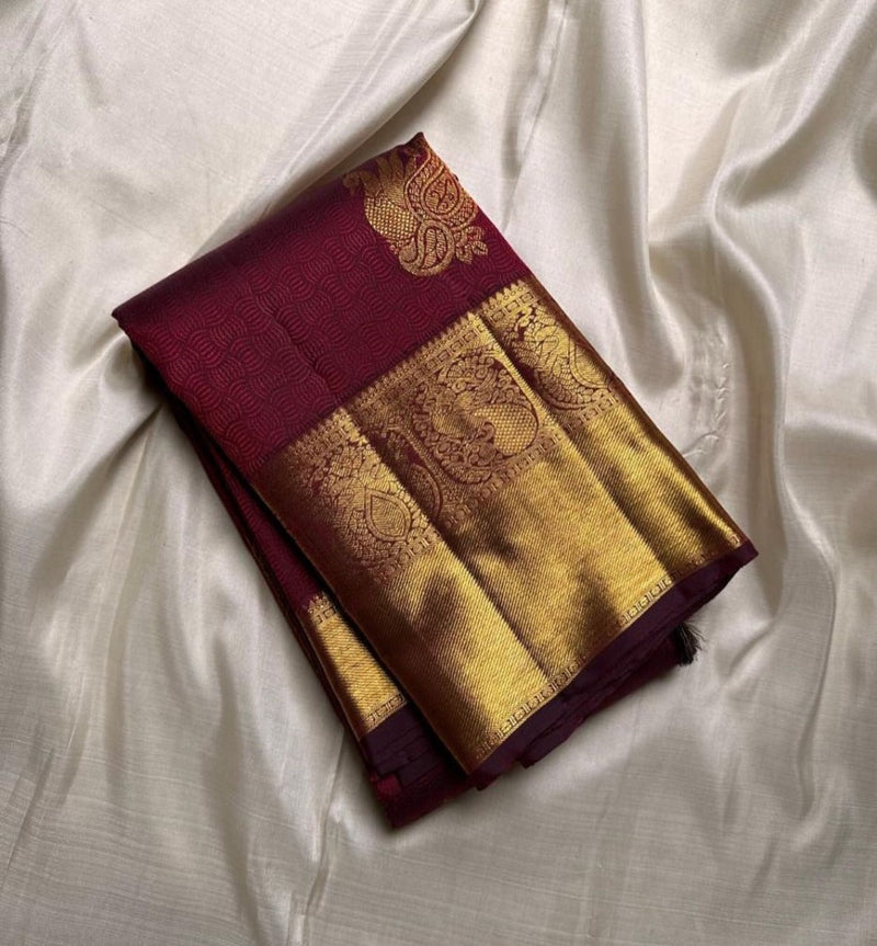 Maroon Kanjivaram Silk Saree with Golden Peacock Motifs
