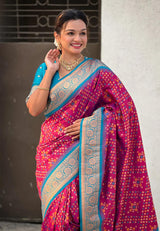Turquoise Maroon Banarasi Silk Saree – Festive Radiance in Every Drape