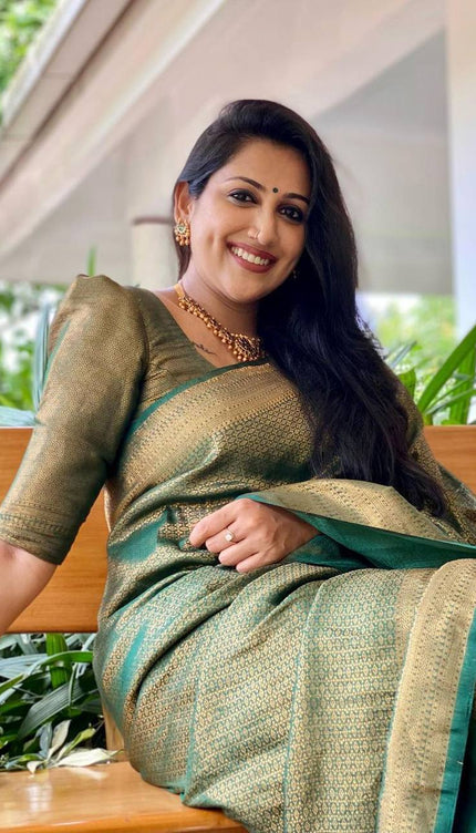 Mitera Green Woven Designer Party Wear Soft Silk  Lichi Silk Saree .