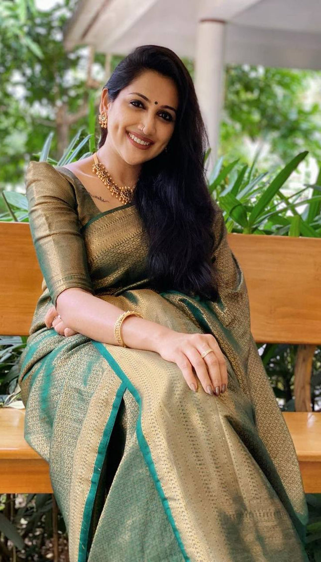 Mitera Green Woven Designer Party Wear Soft Silk  Lichi Silk Saree .