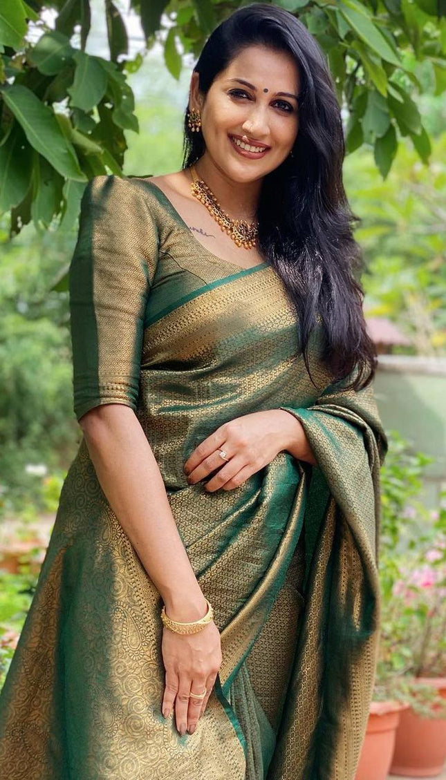 Mitera Green Woven Designer Party Wear Soft Silk  Lichi Silk Saree .