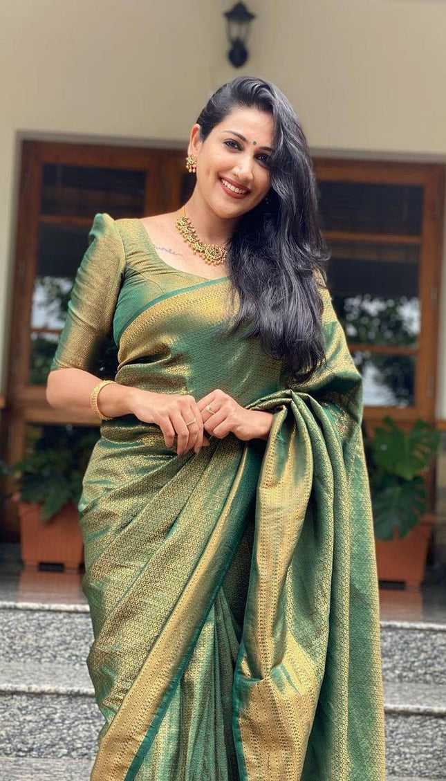Mitera Green Woven Designer Party Wear Soft Silk  Lichi Silk Saree .