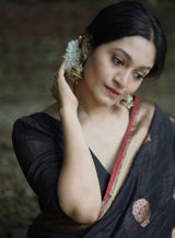 Surpassing Black Soft Silk Saree