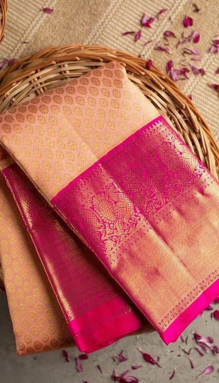 Vrishti - Peach Soft Banarasi Silk Saree with Pink Jacquard Zari Border
